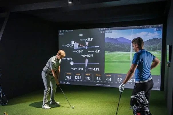 Man setting up for a Shot on Golf Simulator
